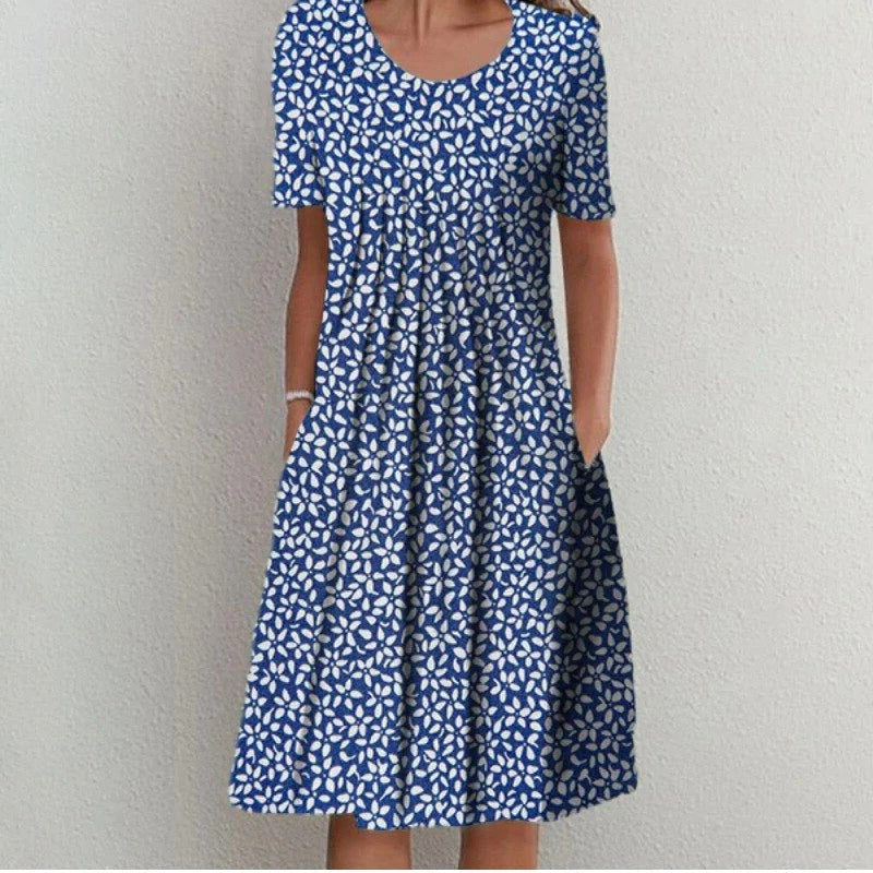 Knee Length Floral Dress with Hidden Side Pockets and Lightweight Fabric