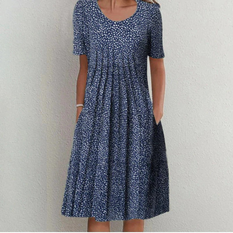 Knee Length Floral Dress with Hidden Side Pockets and Lightweight Fabric